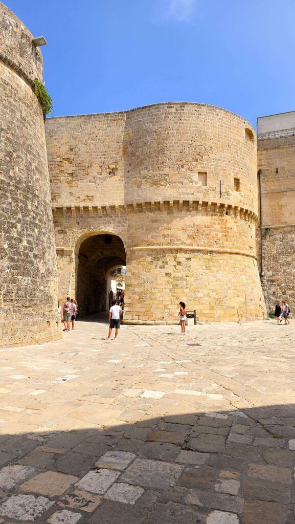 Imposing stone walls and entrance of Otranto Castle in Puglia.