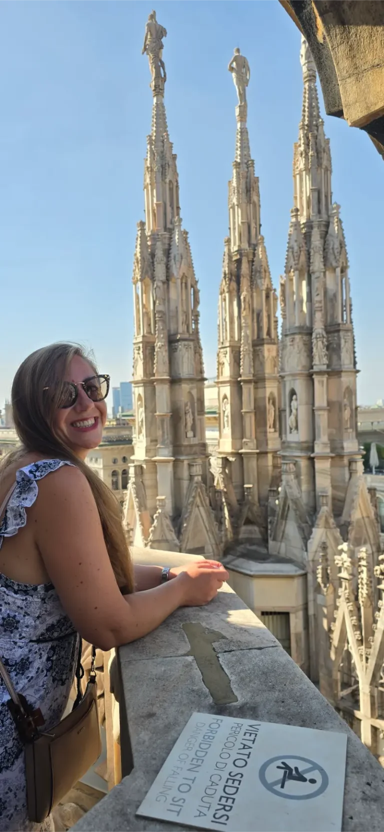 Milan travel guide photo taken on the rooftop of Duomo di Milano, with Gothic spires and panoramic views over the city