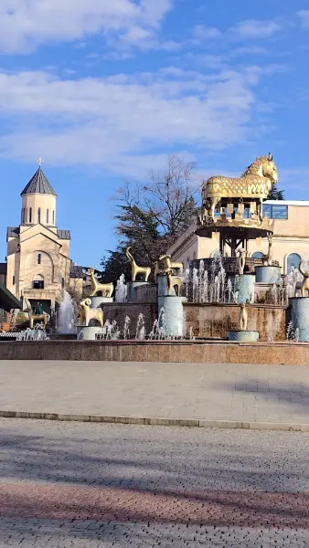 The golden statues of the Colchis Fountain in central Kutaisi, a highlight for any Kutaisi travel guide exploring the city's ancient roots.