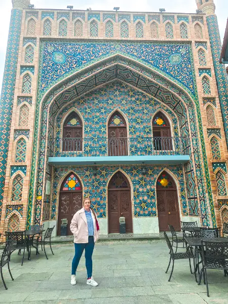 Tbilisi travel guide showing the blue tiled facade of the Orbeliani Bathhouse in Abanotubani.